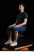  Trent  1 blue jeans casual dressed green t shirt sitting white sneakers whole body 0007.jpg